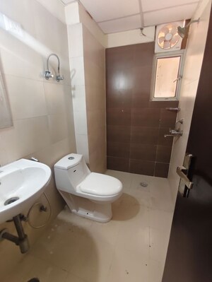 Bathroom in 3 BHK Apartment at Proview Officer City 2, Raj Nagar Extension – for Rent