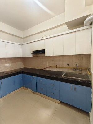 Kitchen in 3 BHK Apartment at Proview Officer City 2, Raj Nagar Extension – for Rent
