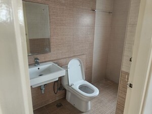 Bathroom in 3 BHK Apartment at Aparna Sarovar, Nallagandla – for Rent