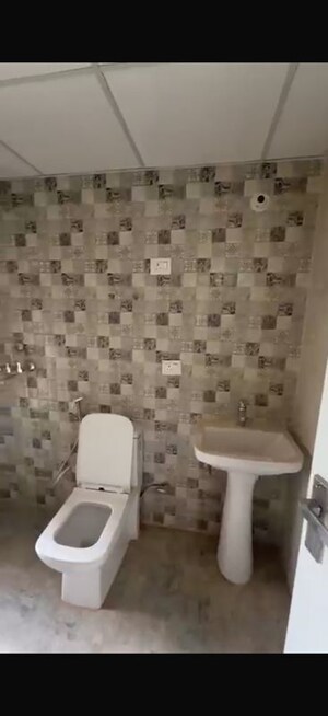 Bathroom in 1 BHK Apartment at Nilaya Greens, Raj Nagar Extension – for Rent