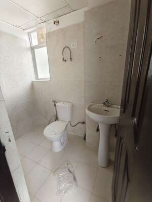 Bathroom in 2 BHK Apartment at Proview Officer City 2, Raj Nagar Extension – for Rent