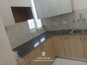 Kitchen in 2 BHK Apartment at Amrapali Enchante, Tech Zone 4 Greater Noida – for Rent