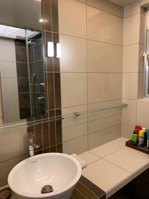 Bathroom in 3 BHK Apartment at Samartha Aangan, Andheri West – for Rent