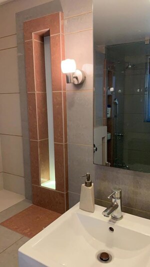 Bathroom in 3 BHK Apartment at Samartha Aangan, Andheri West – for Rent