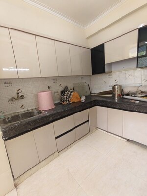Kitchen in 2 BHK Apartment at Proview Officer City, Raj Nagar Extension – for Sale