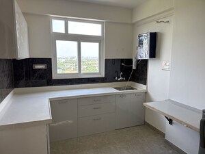 Kitchen in 1 BHK Apartment at Vardhman Empire Estate, Mahapura – for Rent