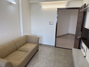 Living Room in 1 BHK Apartment at Vardhman Empire Estate, Mahapura – for Rent