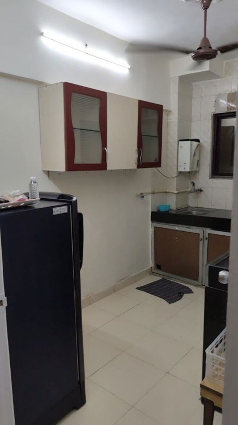 Kitchen, nirman-kutir 2 Bedroom 1100 Sq.Ft. Apartment In Yari Road Mumbai 10671187