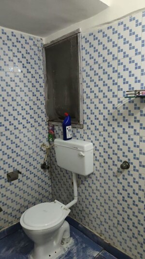 Bathroom in 2 BHK Apartment at Nirman Kutir, Yari Road – for Rent
