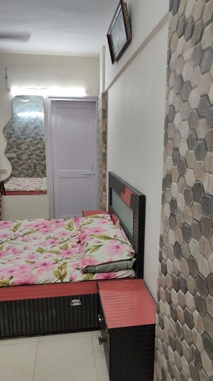 Bedroom in 2 BHK Apartment at Nirman Kutir, Yari Road – for Rent