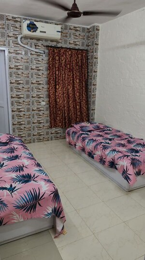 Bedroom in 2 BHK Apartment at Nirman Kutir, Yari Road – for Rent