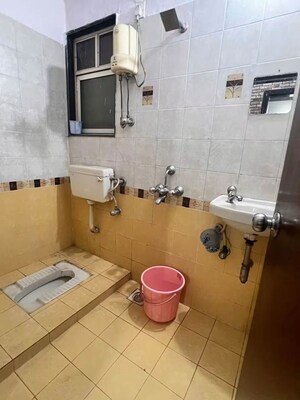 Bathroom in 1 BHK Apartment at Bhoomi Park, Malad West – for Rent
