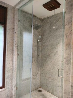 Bathroom in 4 BHK Apartment at Vasant Vihar – for Rent