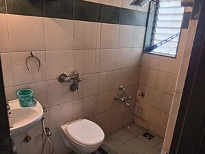 Bathroom in 1 BHK Apartment at Je and Vee Vrindavan, Malad East – for Rent