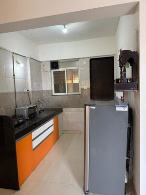 Kitchen in 2 BHK Apartment at Sai Raj Heights, Punawale – for Rent