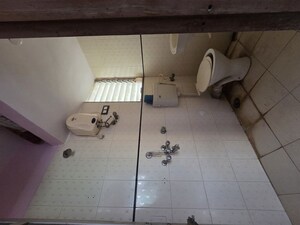 Bathroom in 1 BHK Apartment at Nav Jyotirling CHS, Malad East – for Rent