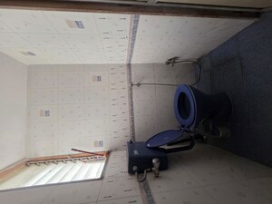 Bathroom in 1 BHK Apartment at Nav Jyotirling CHS, Malad East – for Rent