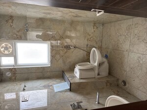 Bathroom in 3 BHK Apartment at Vardhman Empire Estate, Mahapura – for Rent