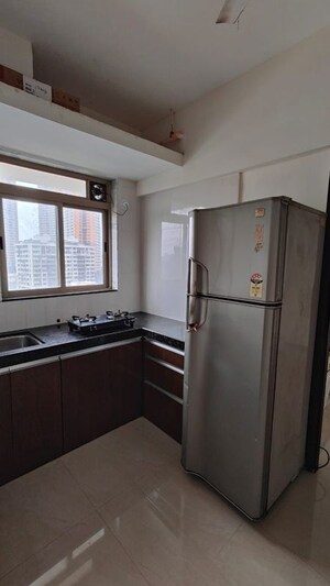 Kitchen in 2 BHK Apartment at Je and Vee Vrindavan, Malad East – for Rent