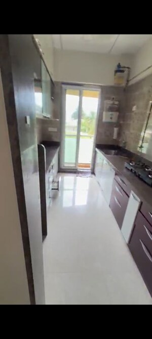 Kitchen in 2.5 BHK Apartment at Neelkanth Palm President, Sector 11 Ghansoli – for Rent
