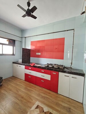 Kitchen in 2 BHK Apartment at Kanchan Pushp Society, Ghodbunder Road – for Rent