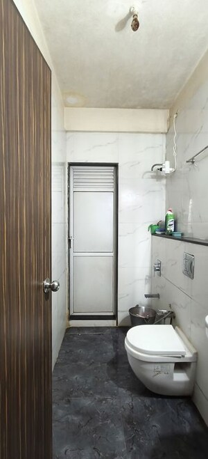 Bathroom in 2 BHK Apartment at Gala Pride Palms, Thane West – for Sale