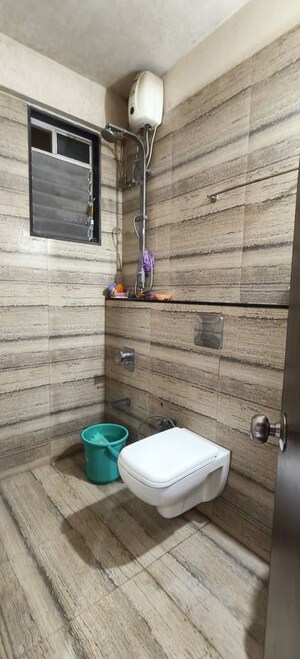 Bathroom in 2 BHK Apartment at Gala Pride Palms, Thane West – for Sale