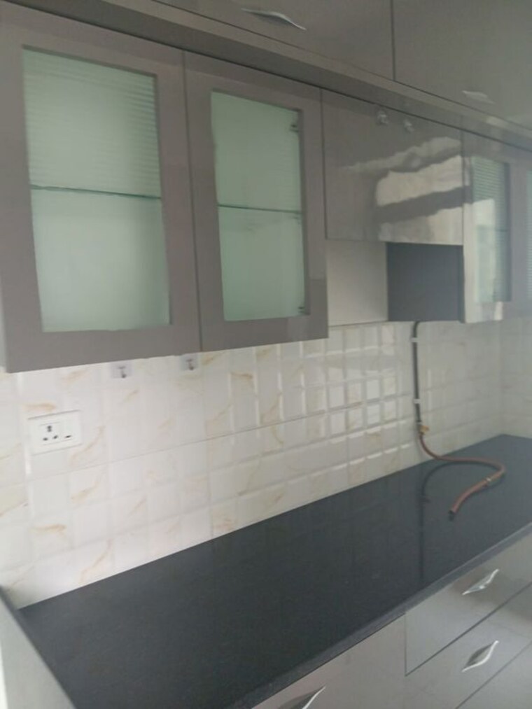 Kitchen, kalpataru-immensa 3 Bedroom 944 Sq.Ft. Apartment In Kolshet Road Thane 10671471