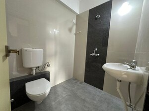Bathroom in 1 BHK Apartment at Mohan Precious Greens, Ambernath – for Sale