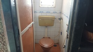Bathroom in 1 BHK Apartment at Harsh Shanti Nagar CHS, Mira Road – for Rent