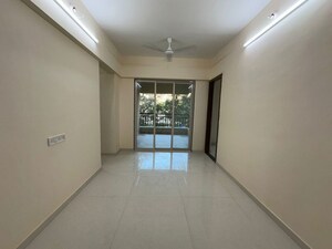 Living Room in 2 BHK Apartment at Mohan Precious Greens, Ambernath – for Sale