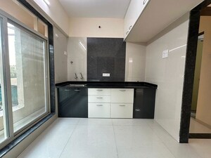Kitchen in 2 BHK Apartment at Mohan Precious Greens, Ambernath – for Sale