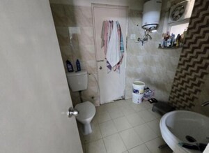 Bathroom in 3 BHK Apartment at Gaur Atulyam, Omicron I Greater Noida – for Rent