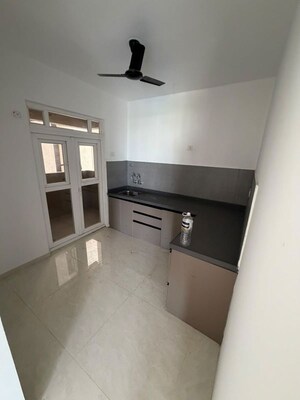 Kitchen in 3 BHK Apartment at Sukhwani Kingsley, Thergaon – for Rent
