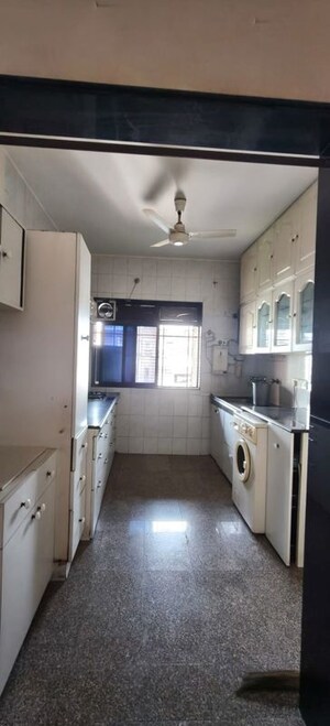 Kitchen in 3 BHK Apartment at Indra Darshan Apartment, Andheri West – for Sale
