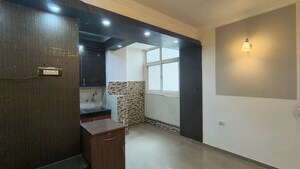 Kitchen in 2 BHK Apartment at High End Paradise II, Raj Nagar Extension – for Sale