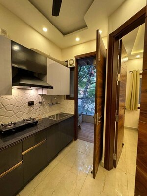 Kitchen in 2 BHK Apartment at Freedom Fighters Enclave – for Rent
