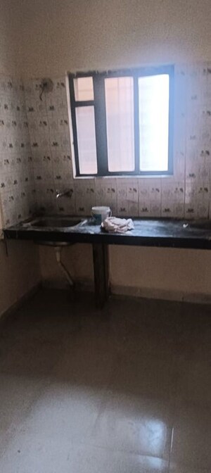 Kitchen in 2 BHK Apartment at Nimhan Vedant Residency, Pashan Sus Road – for Rent
