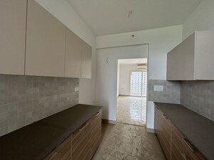 Kitchen in 3.5 BHK Apartment at ATS Homekraft Pious Hideaways, Sector 150 – for Rent