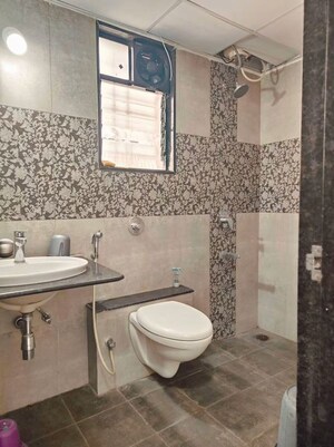 Bathroom in 1.5 BHK Apartment at Tirupati Regalia Phase 2, Vishrantwadi – for Rent