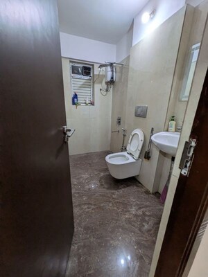 Bathroom in 1 BHK Apartment at HPCL Employees CHS, Tilak Nagar – for Sale