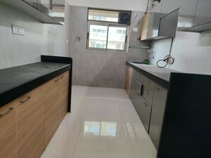 Kitchen in 2 BHK Apartment at Kabra Paradise, Andheri West – for Sale