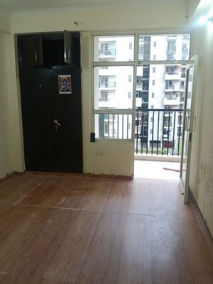 Room in 2 BHK Apartment at Galaxy North Avenue, Gaur City 1 – for Rent