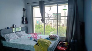 Bedroom in 2 BHK Apartment at Lodha Aqua, Mira Road – for Rent