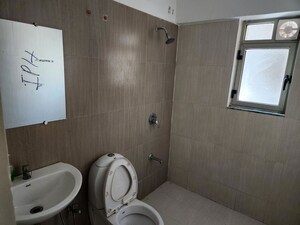 Bathroom in 3 BHK Apartment at The Meadows, Near Vaishno Devi Circle On Sg Highway – for Rent