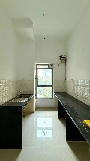 Kitchen in 1 BHK Apartment at Kalpataru Immensa, Kolshet Road – for Sale