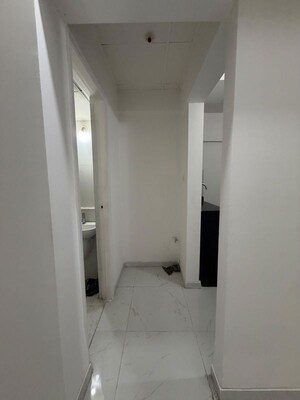 Building Lobby in 1 BHK Apartment at Runwal Gardens, Dombivli East – for Rent