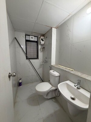 Bathroom in 1 BHK Apartment at Runwal Gardens, Dombivli East – for Rent