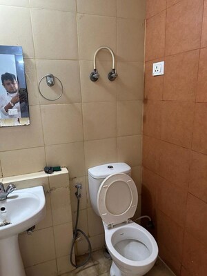 Bathroom in 3 BHK Apartment at Mahagun Mywoods, Sector 16c Greater Noida – for Rent
