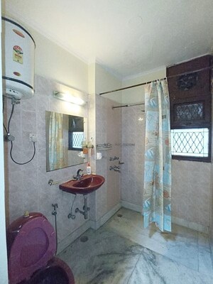 Bathroom in 3 BHK Builder Floor at Pamposh Enclave – for Rent